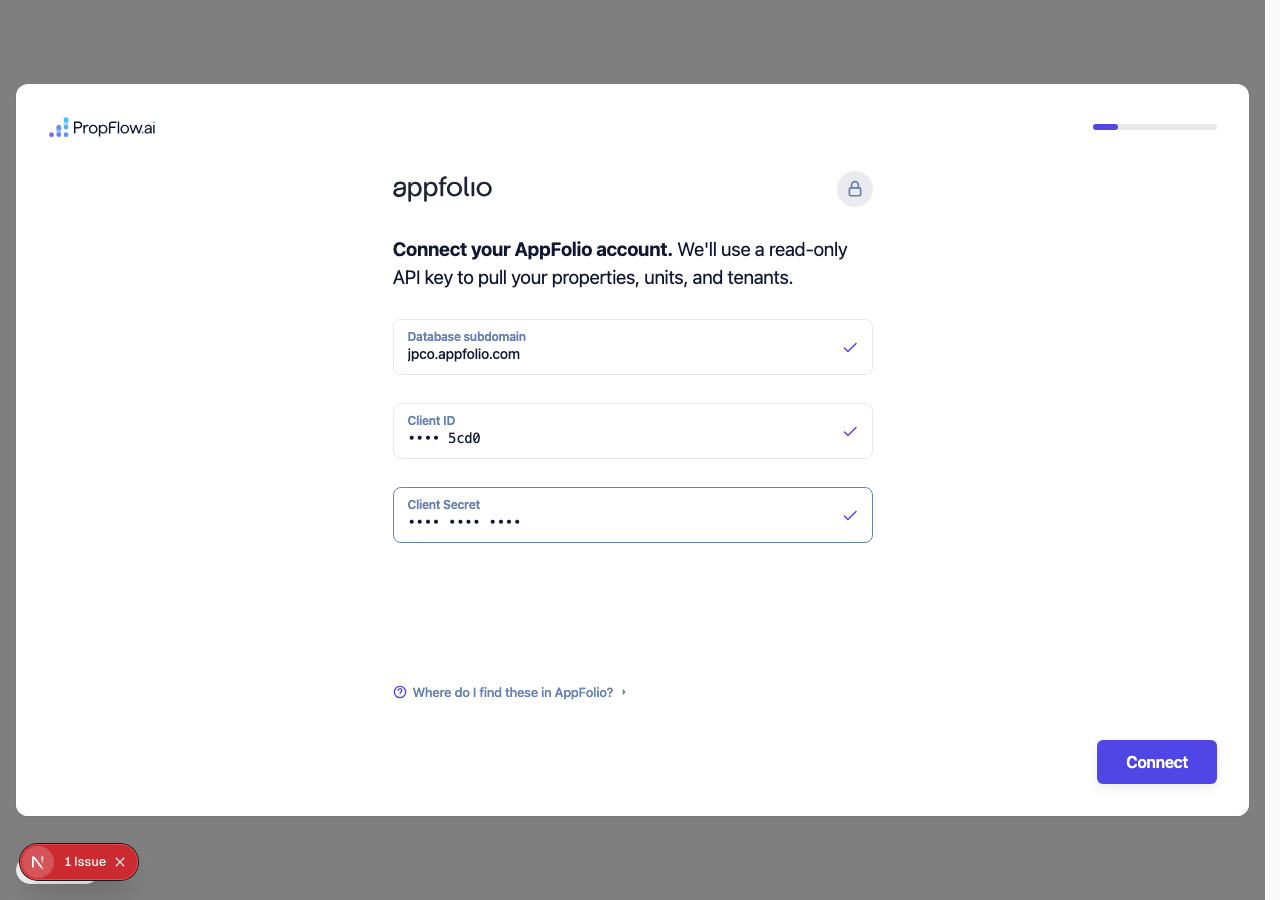 AppFolio connect screen with the real database jpco and a real key typed in, last four characters visible, secret masked